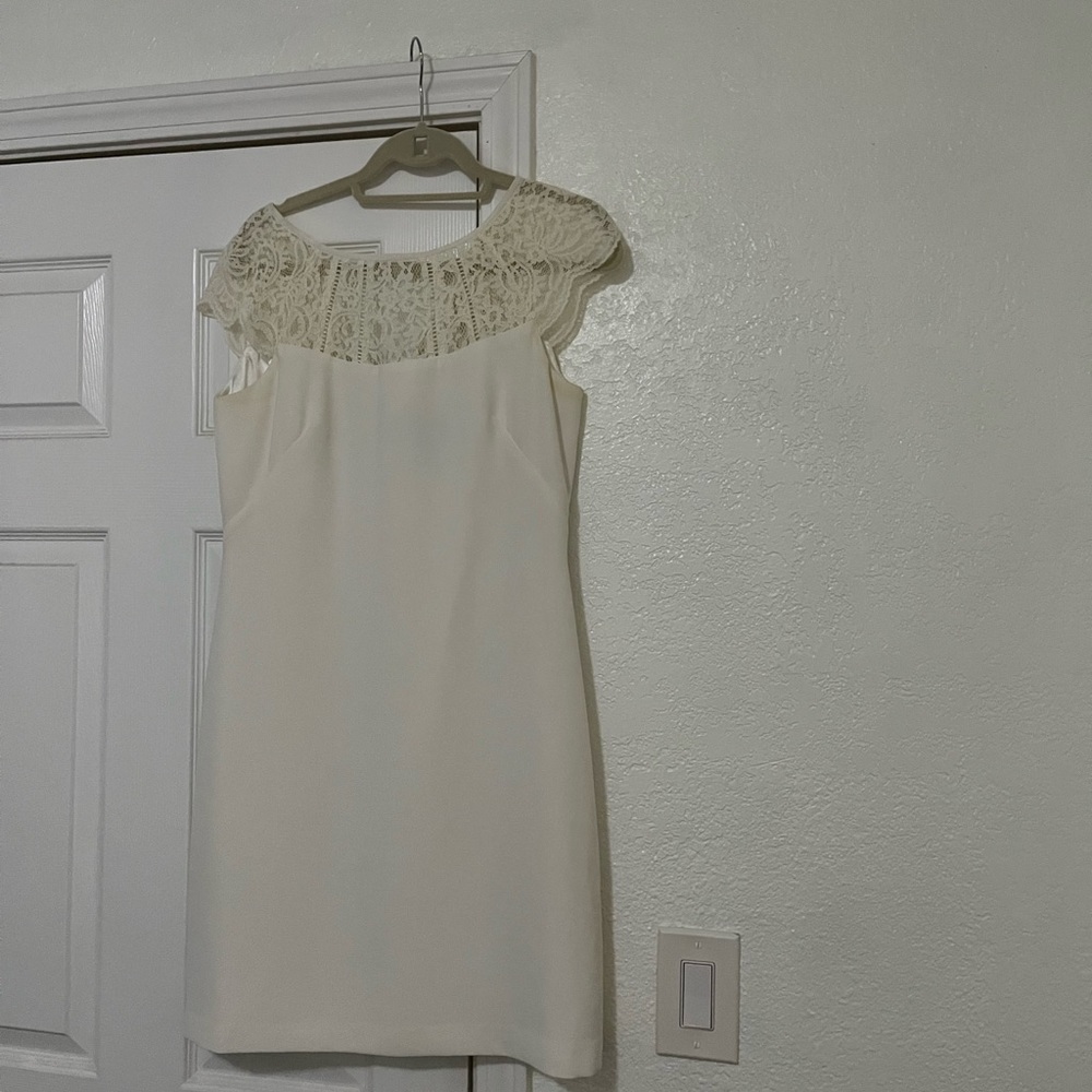 white dress with lace detailing